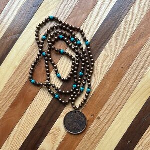Brown and Blue Beaded Necklace with Southwestern Charm